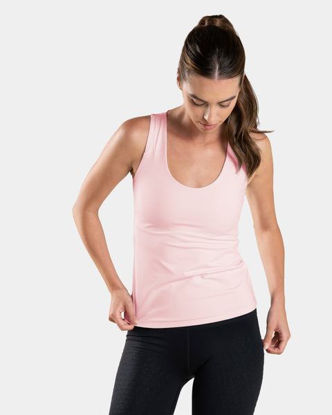 Model wearing L'Original Tank in blush with MicroPerle in the back for lymphatic drainage, compression, reduce fatigue